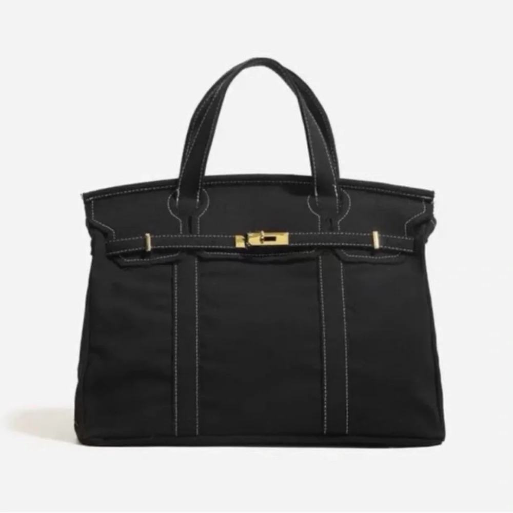 Vintage Stylish and Spacious Boatkin Bag in Black with Gold Buckle